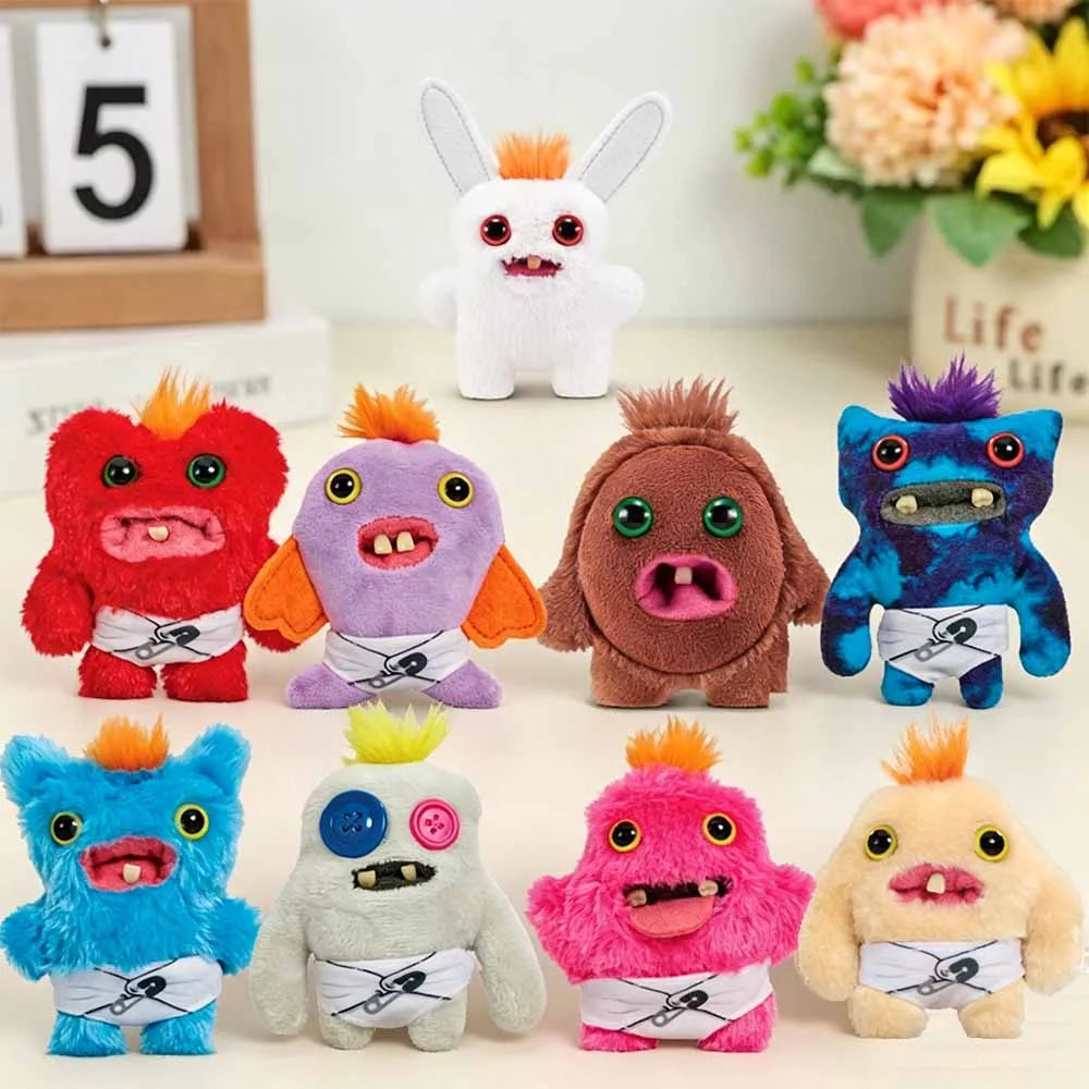 Baby Fuggler REEK-O - Peluche Monstruo Ojos Grandes